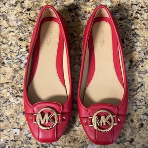 Michael Kors red leather flats. The rubber bottom